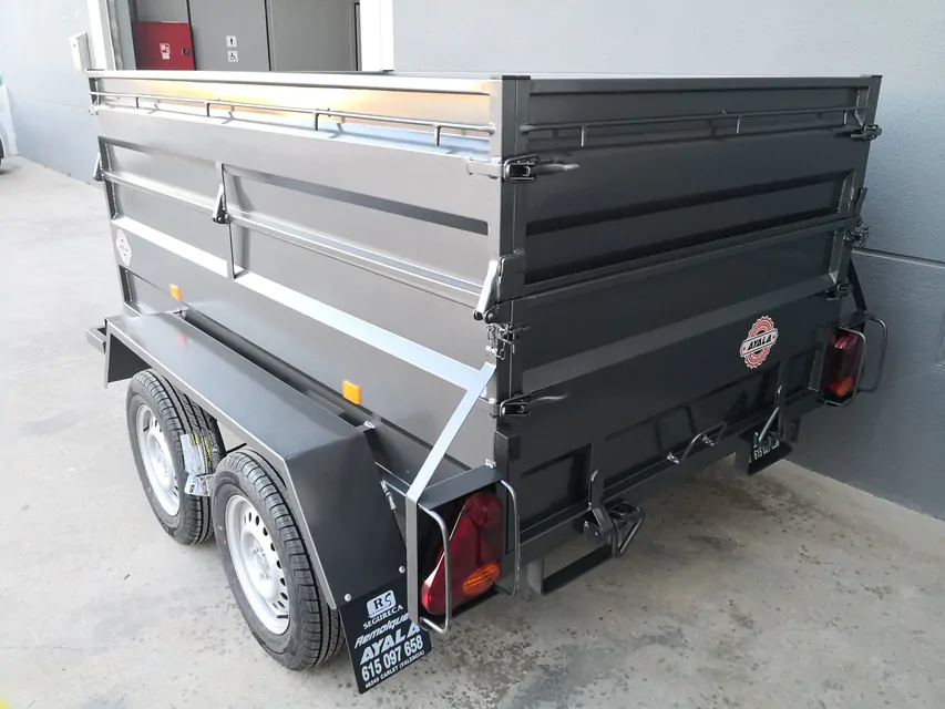 Remolque basculante hidráulico 2 ejes con sobrelateral – Ruedas por fuera –